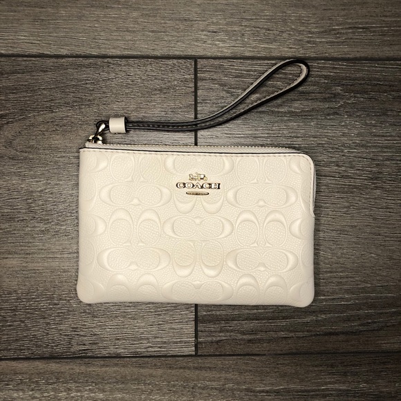 Coach Handbags - Coach white leather monogram wristlet